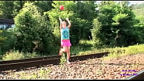 The plays ball near the tracks and her stepfather scolds her and puts his cock in her mouth